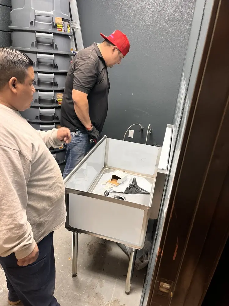 Commercial plumbing and sink installation in McKenzie